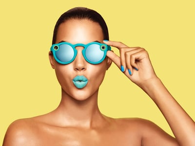 Blue Snapchat Specs on a lady with blue lipstick